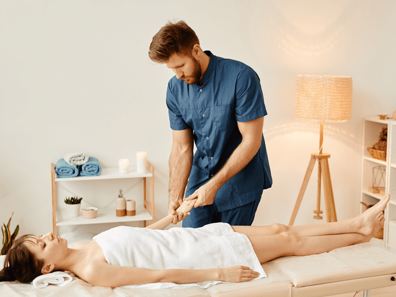 Hot stone massage therapy session